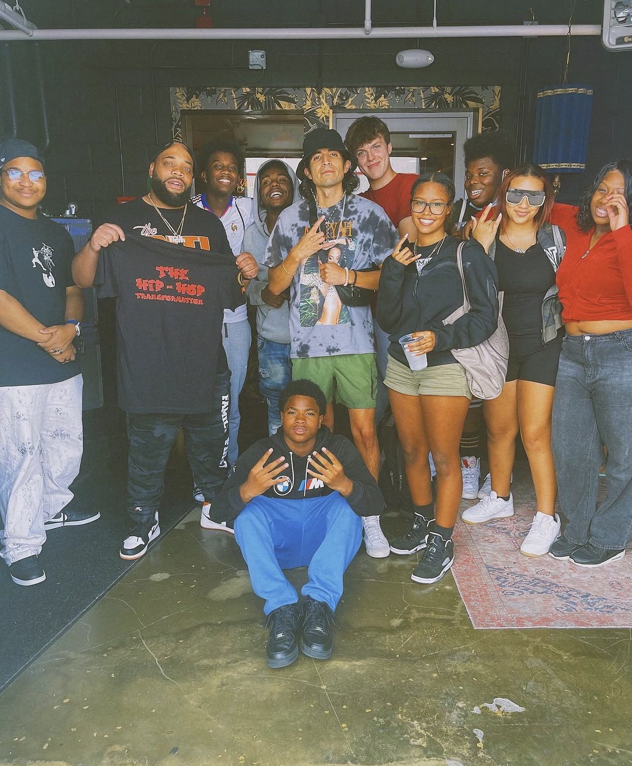 Lightfoot with a group of young participants from The Hip Hop Transformation program
